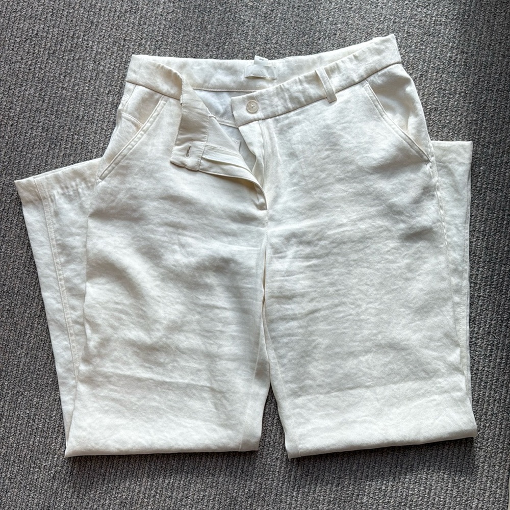 Cream H&M flat front, straight leg trousers.